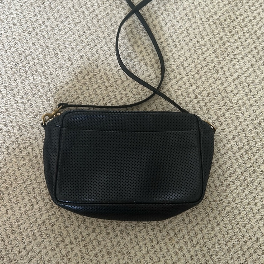 Perforated Marisol w pocket. Black